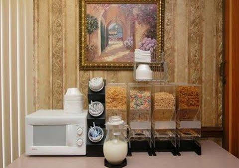 Executive Inn And Suites إنتربرايز المظهر الخارجي الصورة